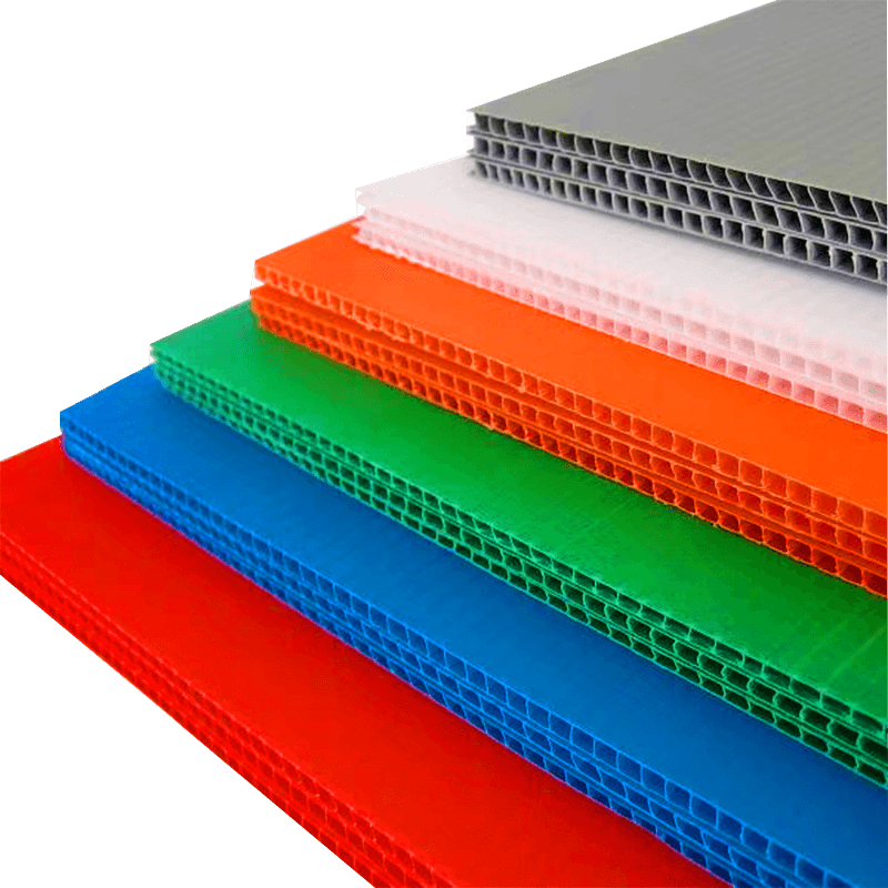 Colorful PP corrugated sheets arranged to show their hollow flute structure